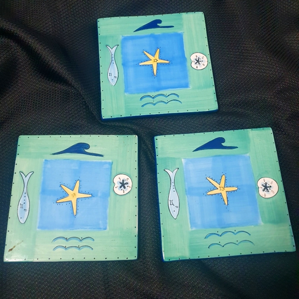R.I.C. Handpainted trivets